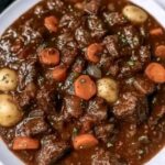 Sausages with caramelized onions